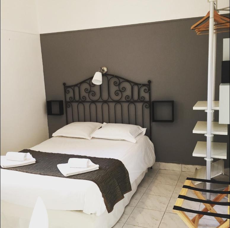 Postel nebo postele na pokoji v ubytování Hotel Danemark