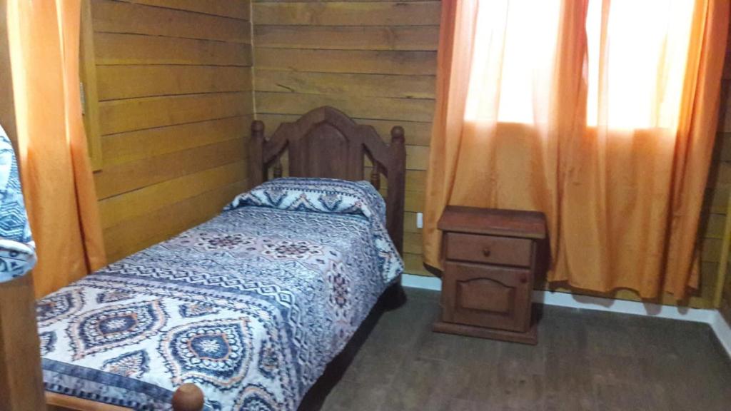 Postel nebo postele na pokoji v ubytování Cabañas El Conejo Negro