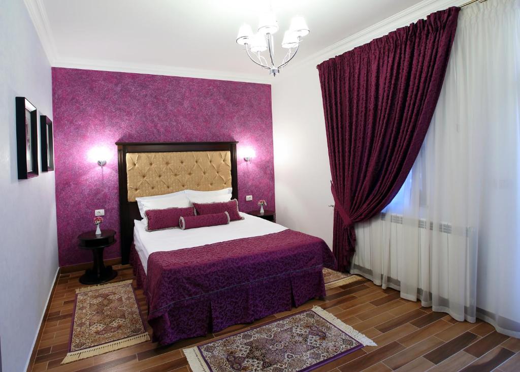 Postel nebo postele na pokoji v ubytování Hotel Galany