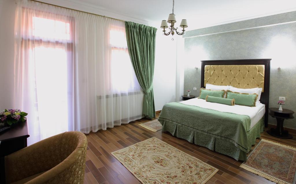 Postel nebo postele na pokoji v ubytování Hotel Galany