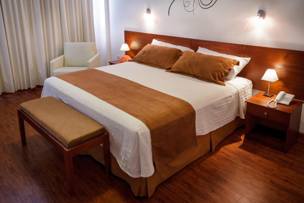 Postel nebo postele na pokoji v ubytování Hotel Ajavi