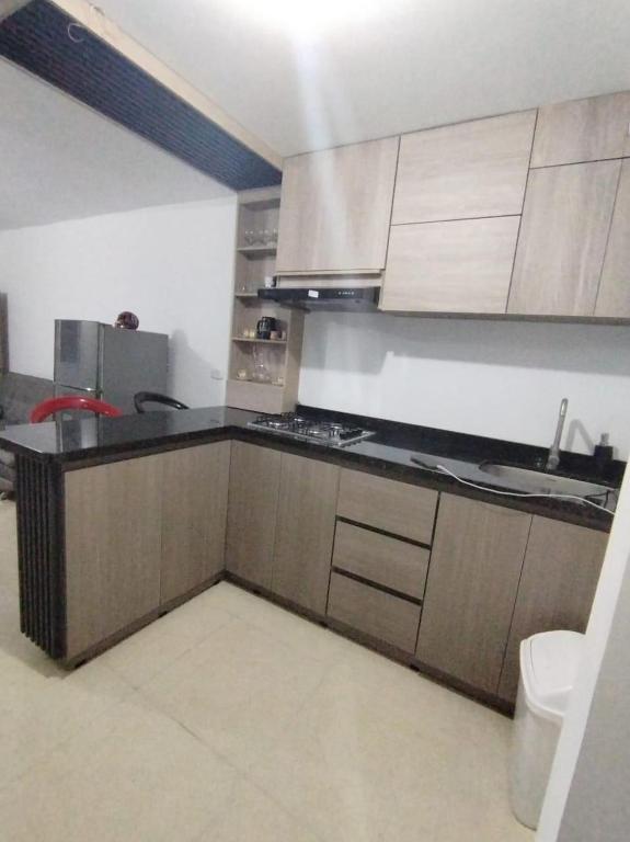 Η κουζίνα ή μικρή κουζίνα στο Agradable y cómodo Apartamento Eje Cafetero