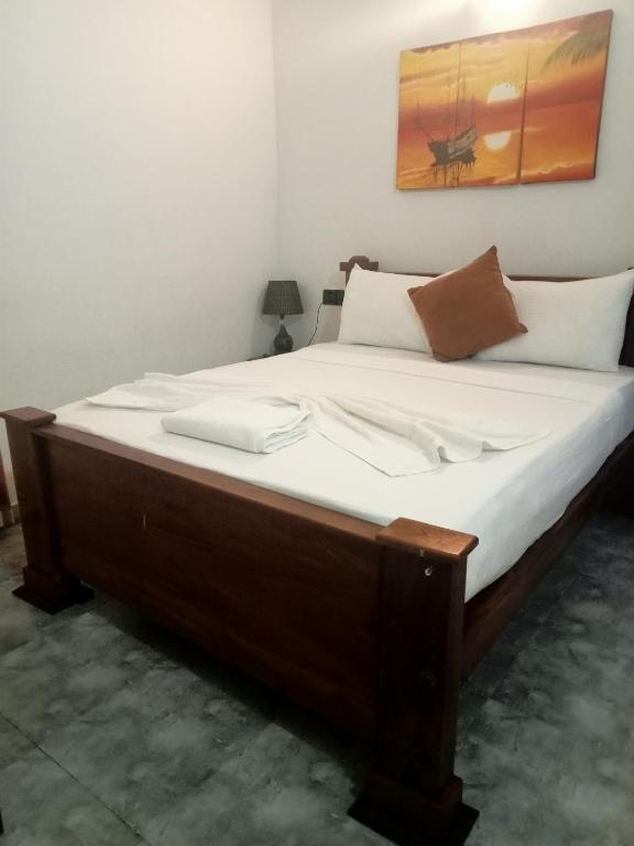 Postel nebo postele na pokoji v ubytování Oviniru Beach Hotel