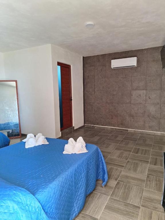 Postel nebo postele na pokoji v ubytování La Playita