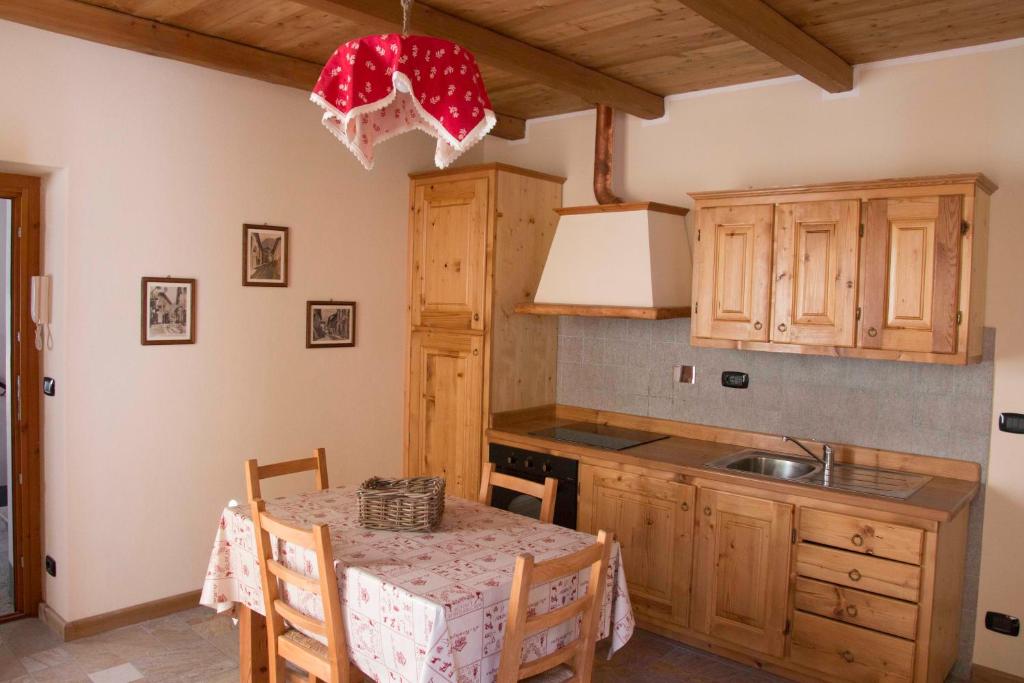 Kuchyň nebo kuchyňský kout v ubytování Le Petit Fenestrelle