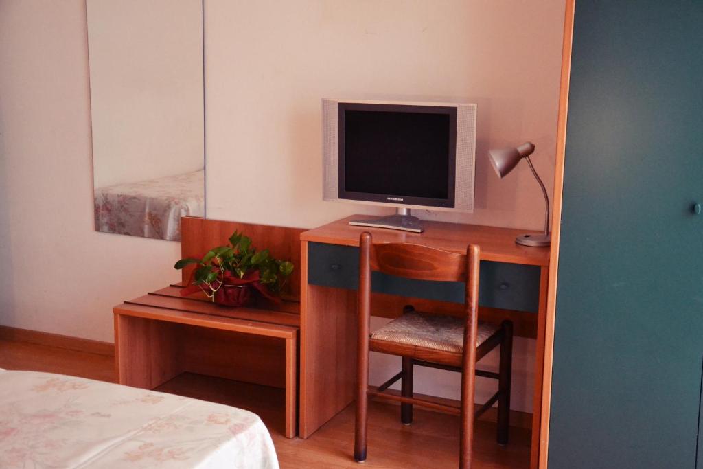 TV a/nebo společenská místnost v ubytování Hotel Rex
