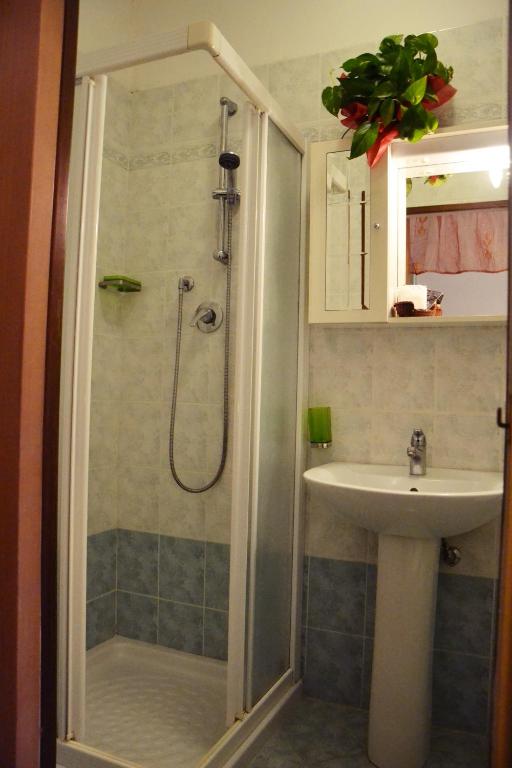Koupelna v ubytování Hotel Rex