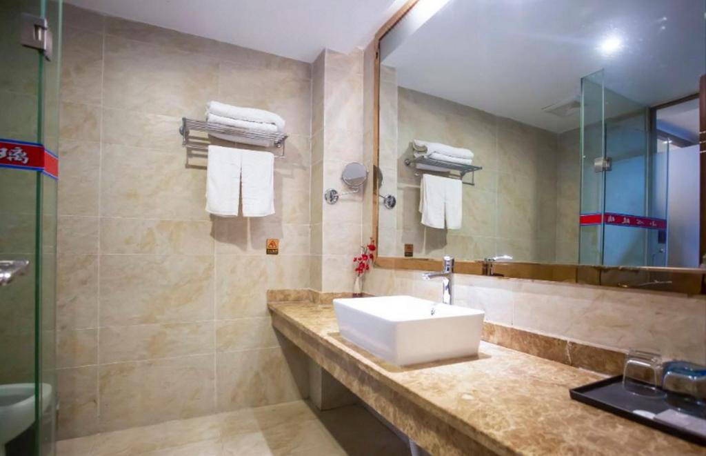 Koupelna v ubytování Zhangjiajie Huan Sha Ju Hotel