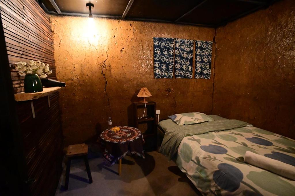 Postel nebo postele na pokoji v ubytování Le Petit Home