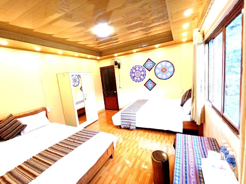 Postel nebo postele na pokoji v ubytování A Kiệt Homestay