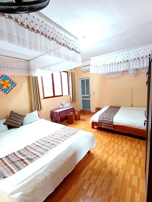 Postel nebo postele na pokoji v ubytování A Kiệt Homestay