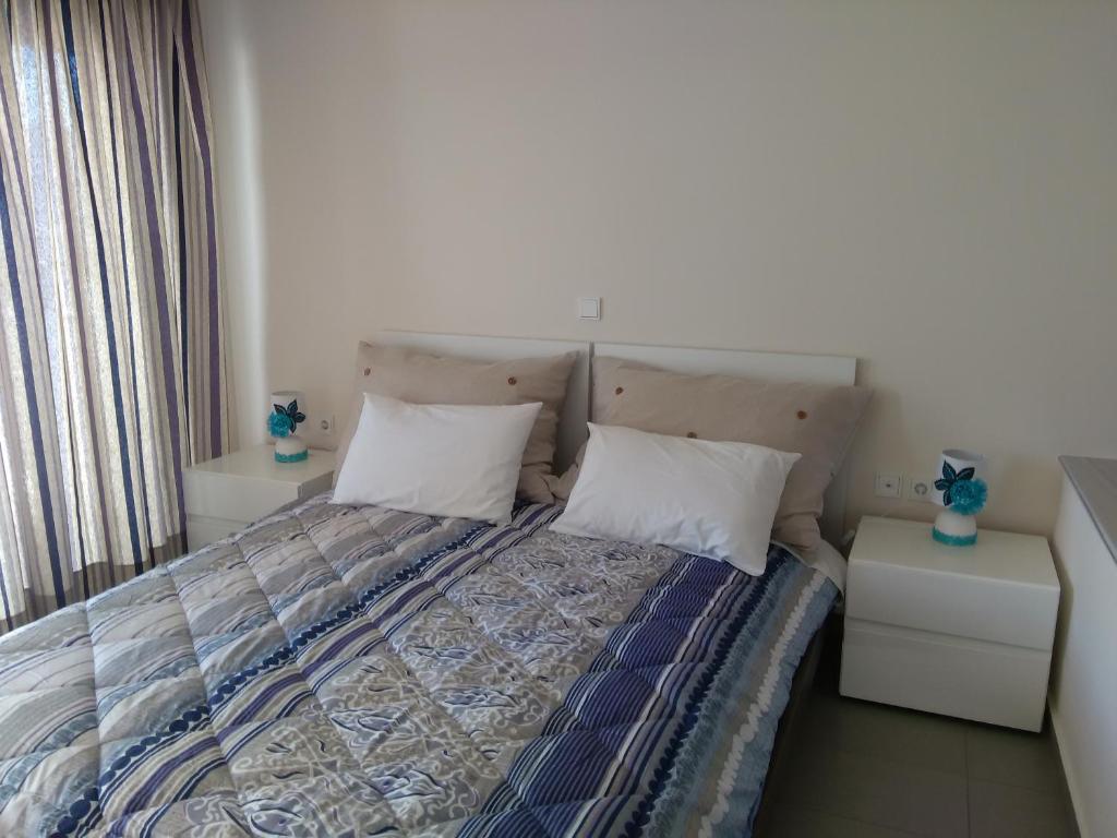 Posteľ alebo postele v izbe v ubytovaní Fevronia's Rooms