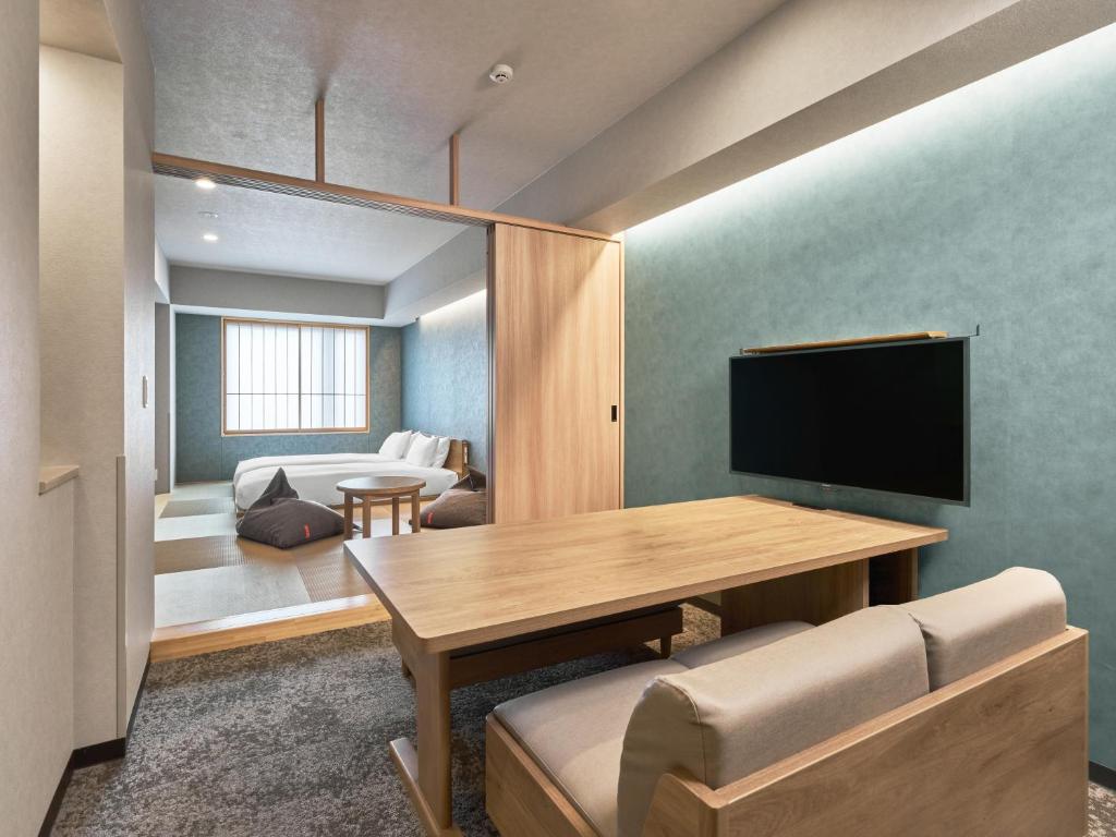TV a/nebo společenská místnost v ubytování MIMARU Tokyo Ikebukuro