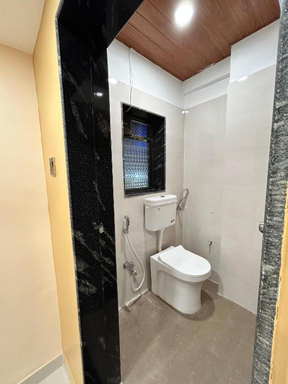Koupelna v ubytování Hotel Alba Inn Shirdi