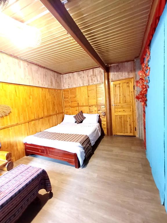 Postel nebo postele na pokoji v ubytování A Kiệt Homestay