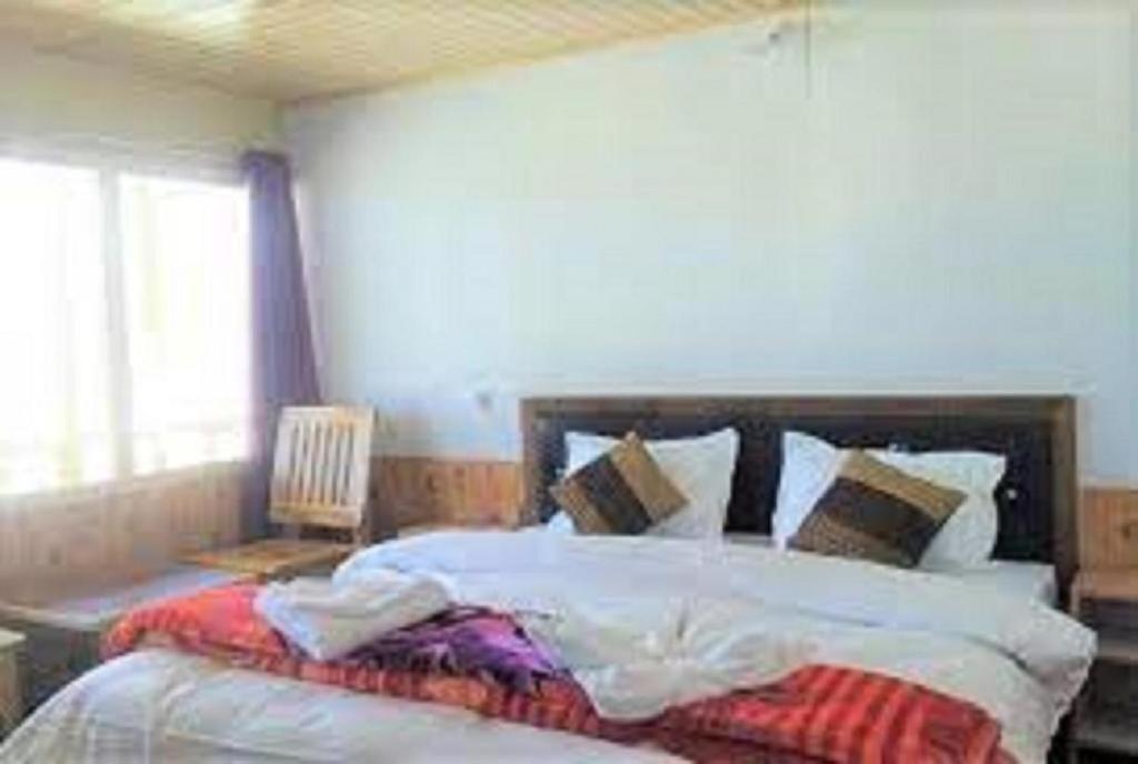 Postel nebo postele na pokoji v ubytování The Ladakh Cottage Pangong, Lake View