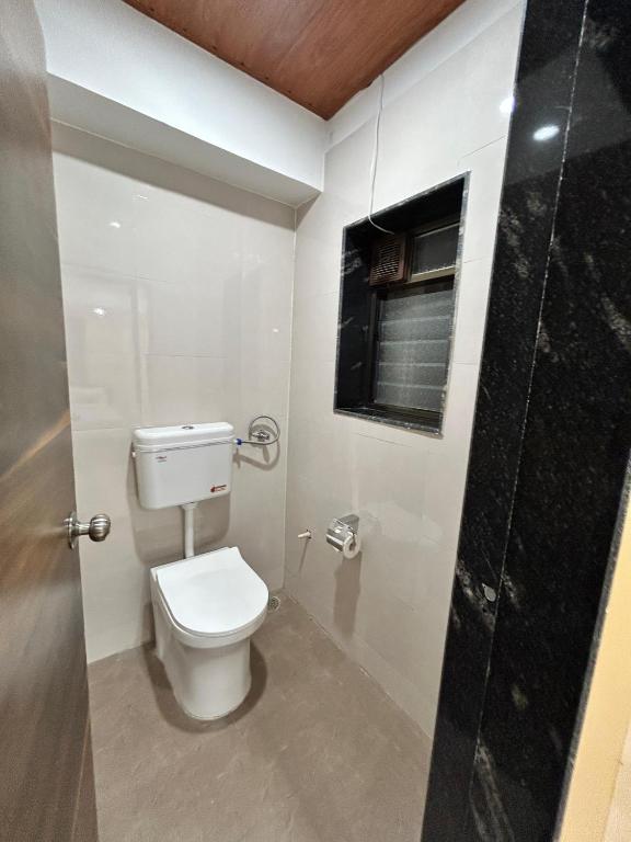 Koupelna v ubytování Hotel Alba Inn Shirdi