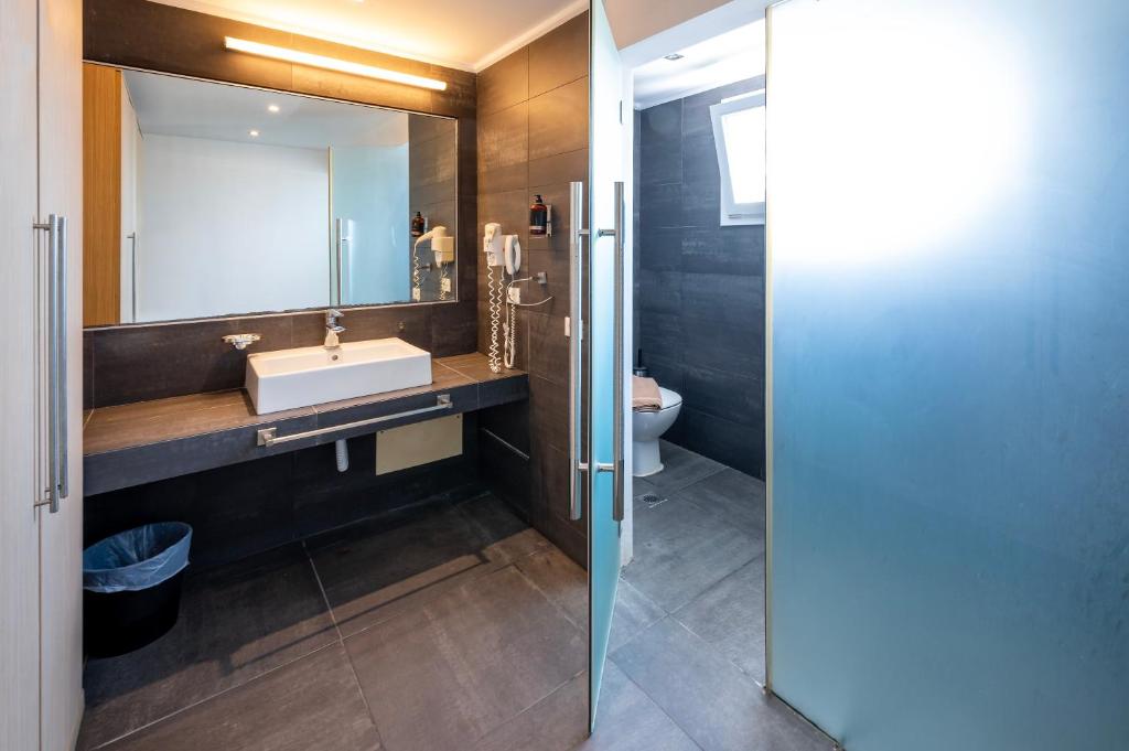 Kúpeľňa v ubytovaní Orizontes Hotel Santorini