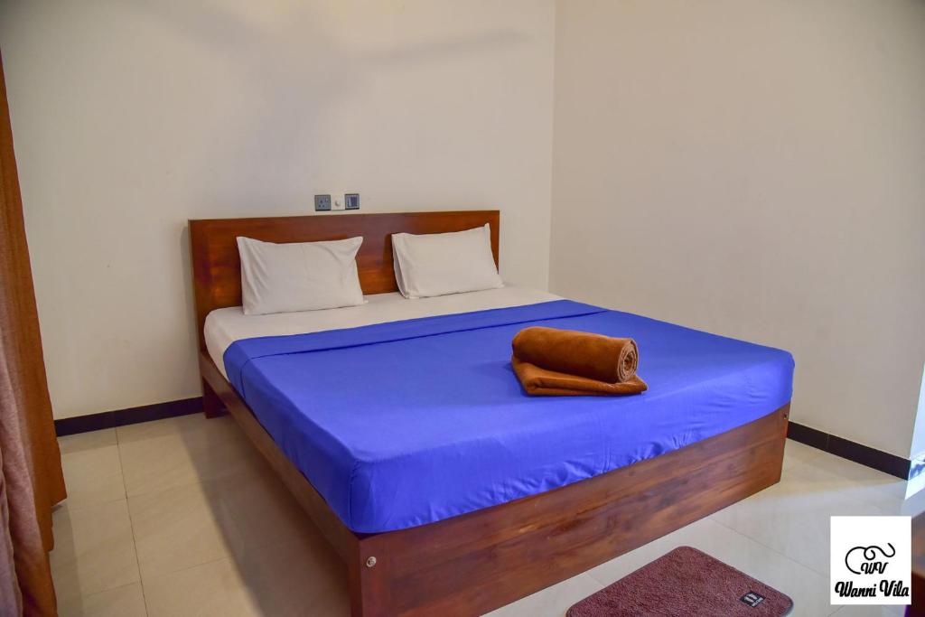 Postel nebo postele na pokoji v ubytování Wanni Villa Resort & Safari