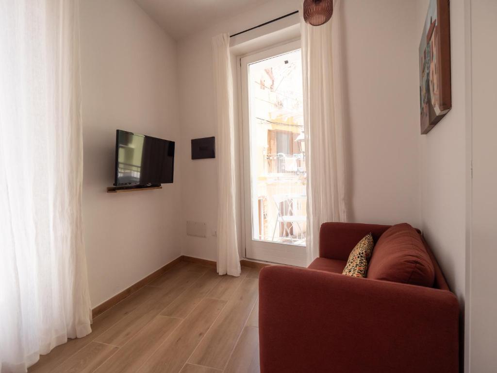 TV a/nebo společenská místnost v ubytování Casa Nora