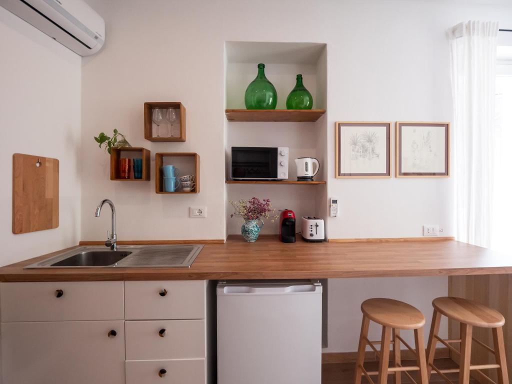 Kuchyň nebo kuchyňský kout v ubytování Casa Nora