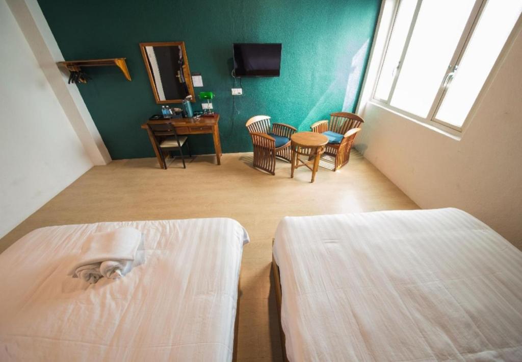 Postel nebo postele na pokoji v ubytování Room V Jalan Sultanah By SECOM