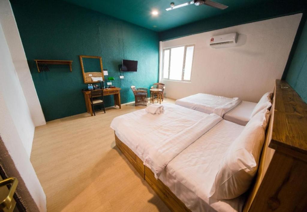Postel nebo postele na pokoji v ubytování Room V Jalan Sultanah By SECOM