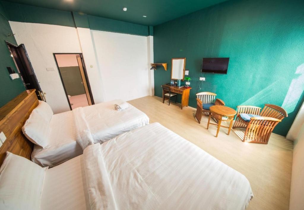 Postel nebo postele na pokoji v ubytování Room V Jalan Sultanah By SECOM