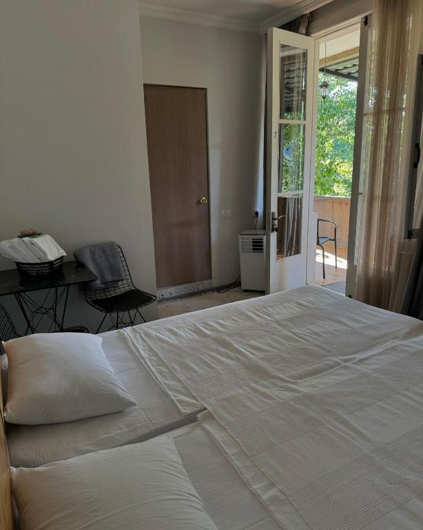 Postel nebo postele na pokoji v ubytování View Racha