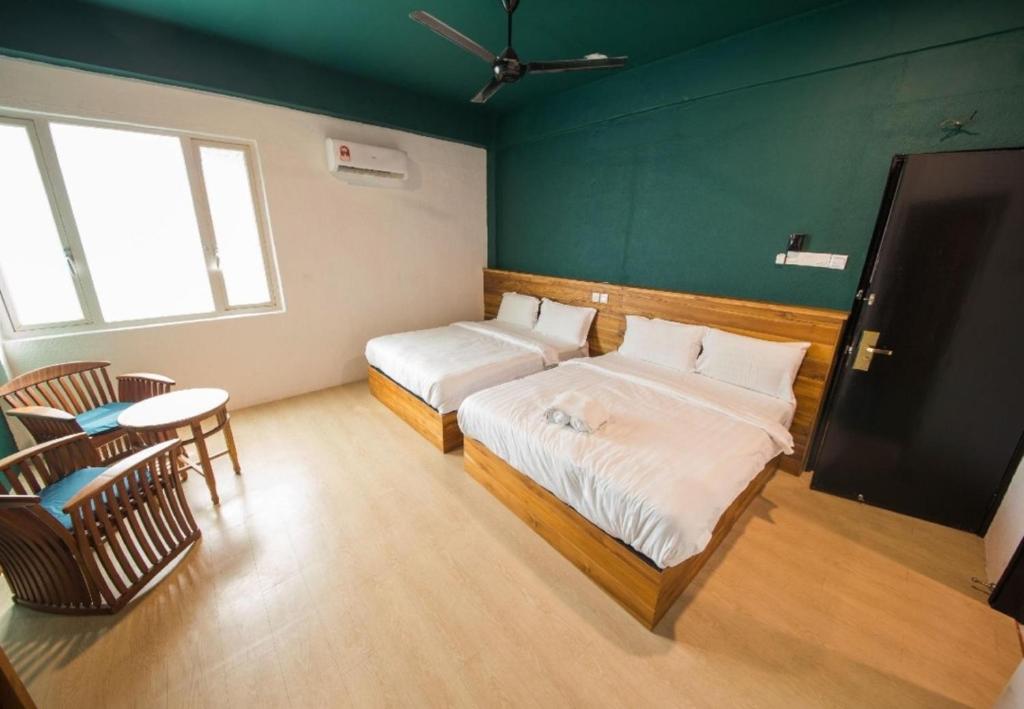 Postel nebo postele na pokoji v ubytování Room V Jalan Sultanah By SECOM