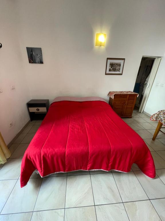 Posteľ alebo postele v izbe v ubytovaní Casa Teatro Greco