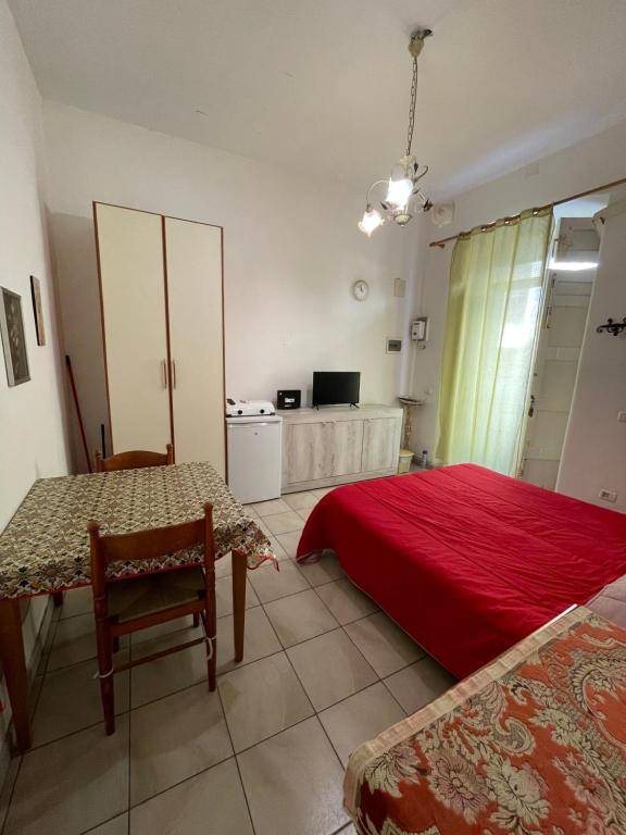 Posteľ alebo postele v izbe v ubytovaní Casa Teatro Greco