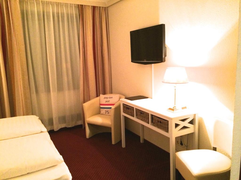 TV a/nebo společenská místnost v ubytování Hotel Waldkur