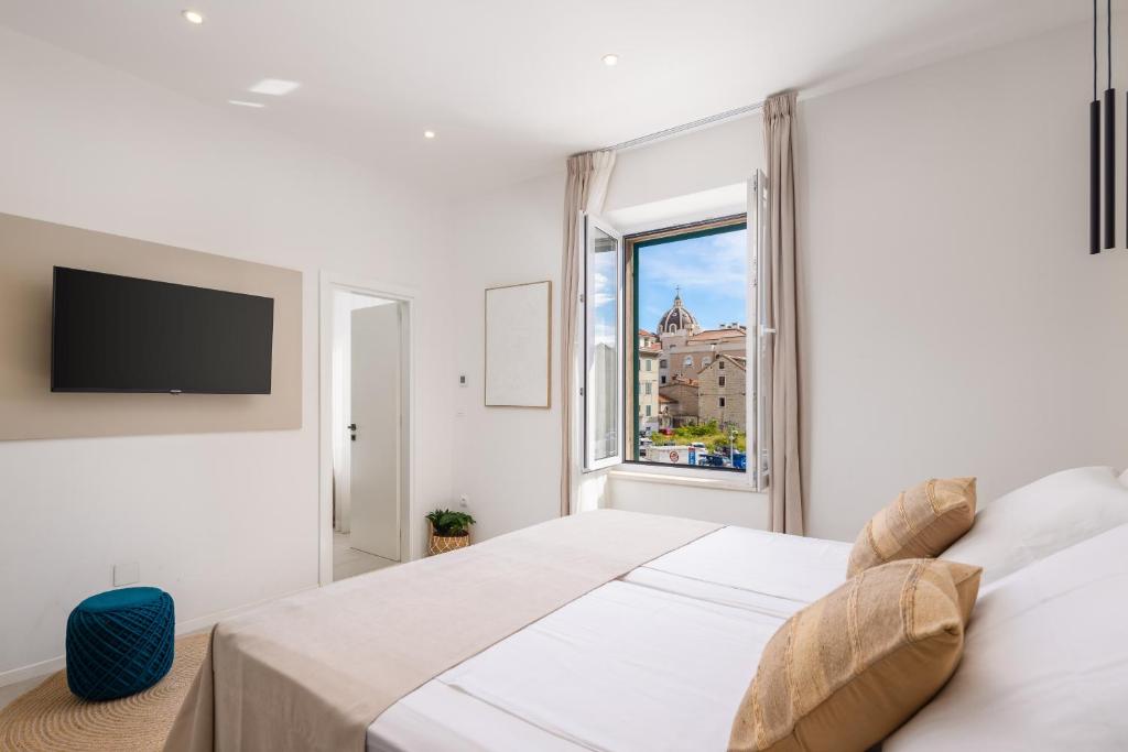 Postel nebo postele na pokoji v ubytování 48 Rooms Split