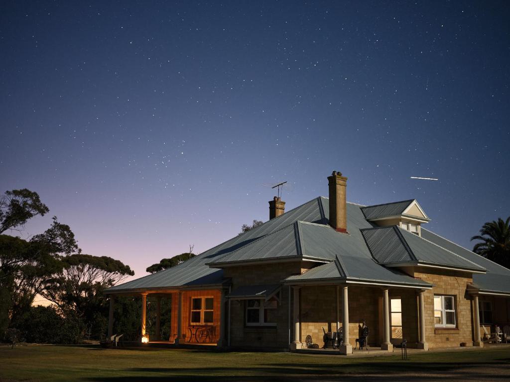 a house with a metal roof on top of it at Forgo tten Paddock in Maitland