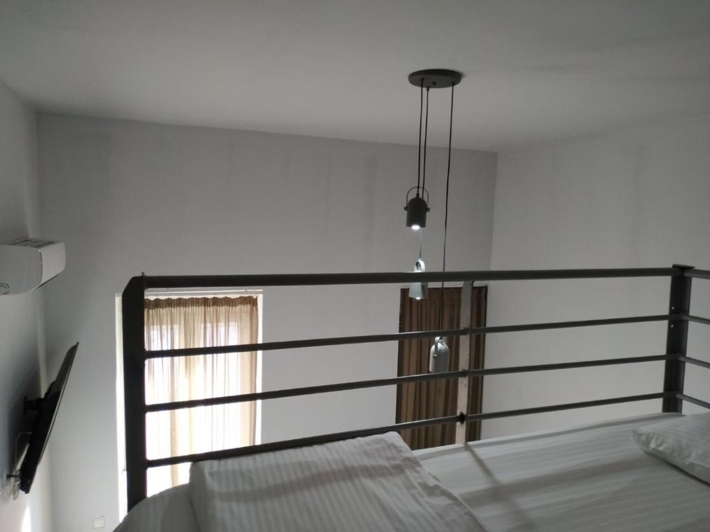 Postel nebo postele na pokoji v ubytování Kentrikon