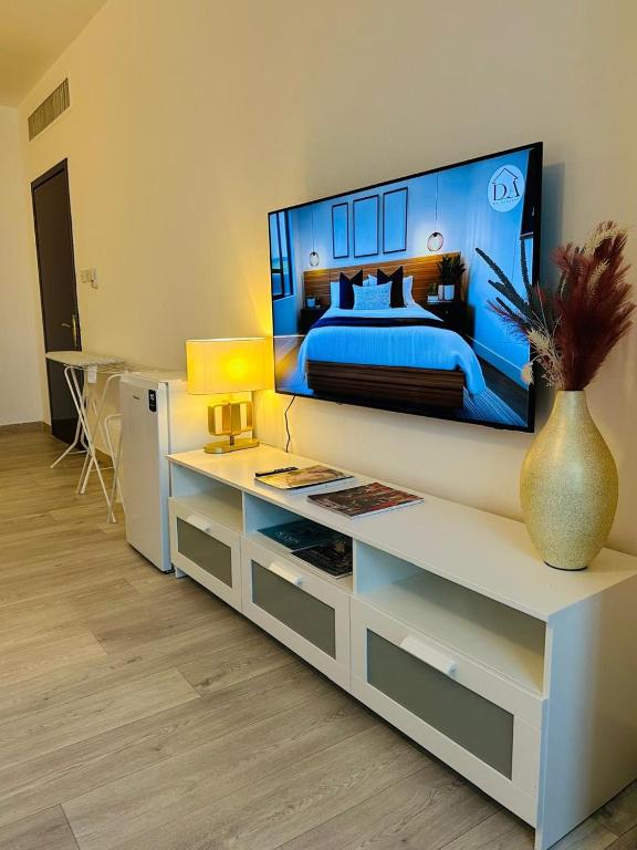 TV a/nebo společenská místnost v ubytování SG Homes