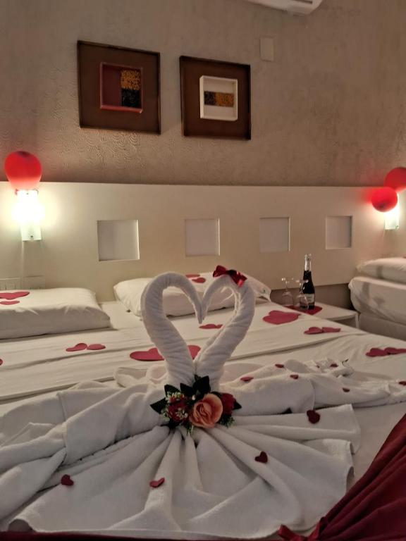 Cama ou camas em um quarto em Pousada Pérola Dourada