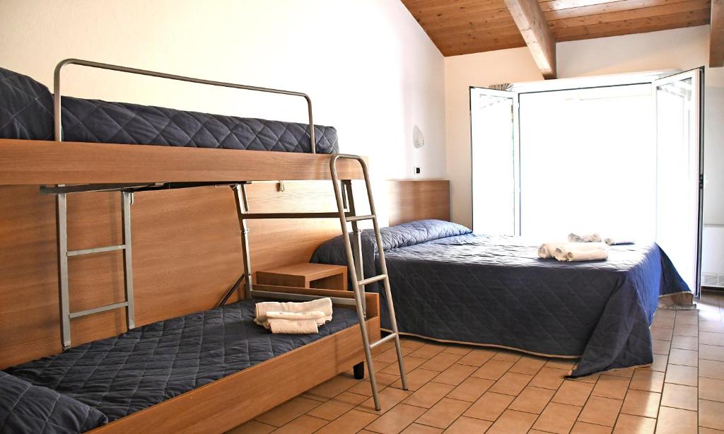 Postel nebo postele na pokoji v ubytování Hotel Edera - in pieno Centro a pochi passi dal Mare