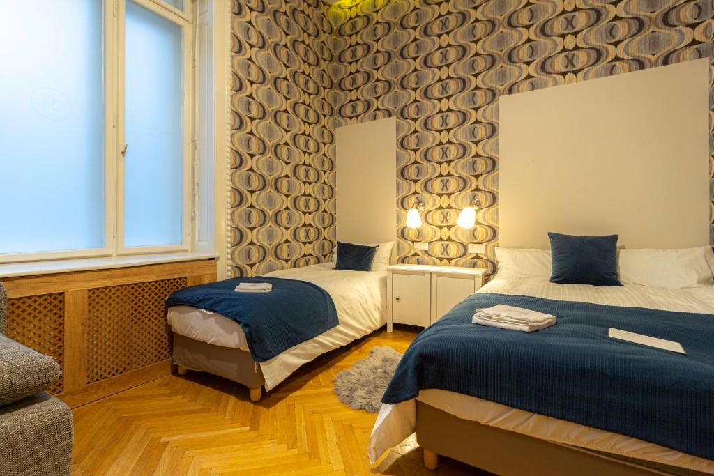 Postel nebo postele na pokoji v ubytování The Cream