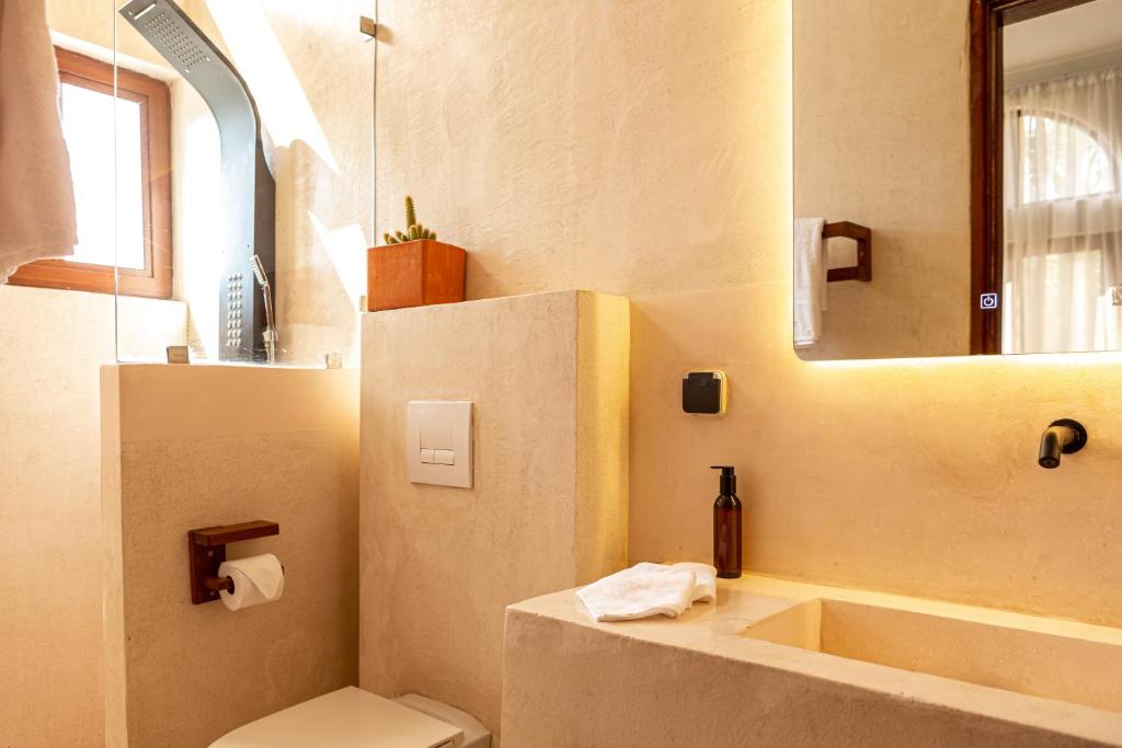 Koupelna v ubytování Tamarin Hôtel Cotonou