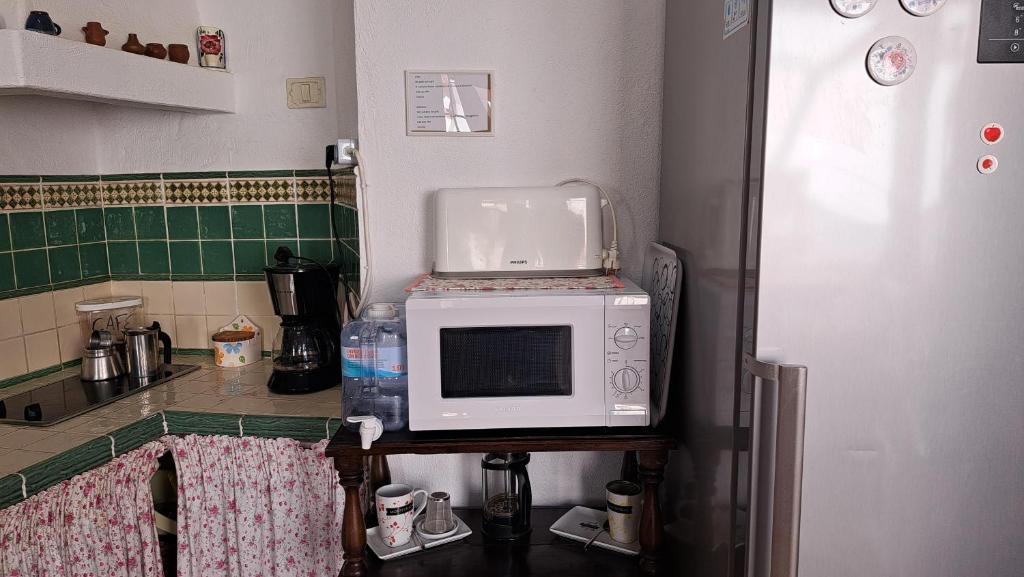 Kuchyň nebo kuchyňský kout v ubytování Casa Santana Segura