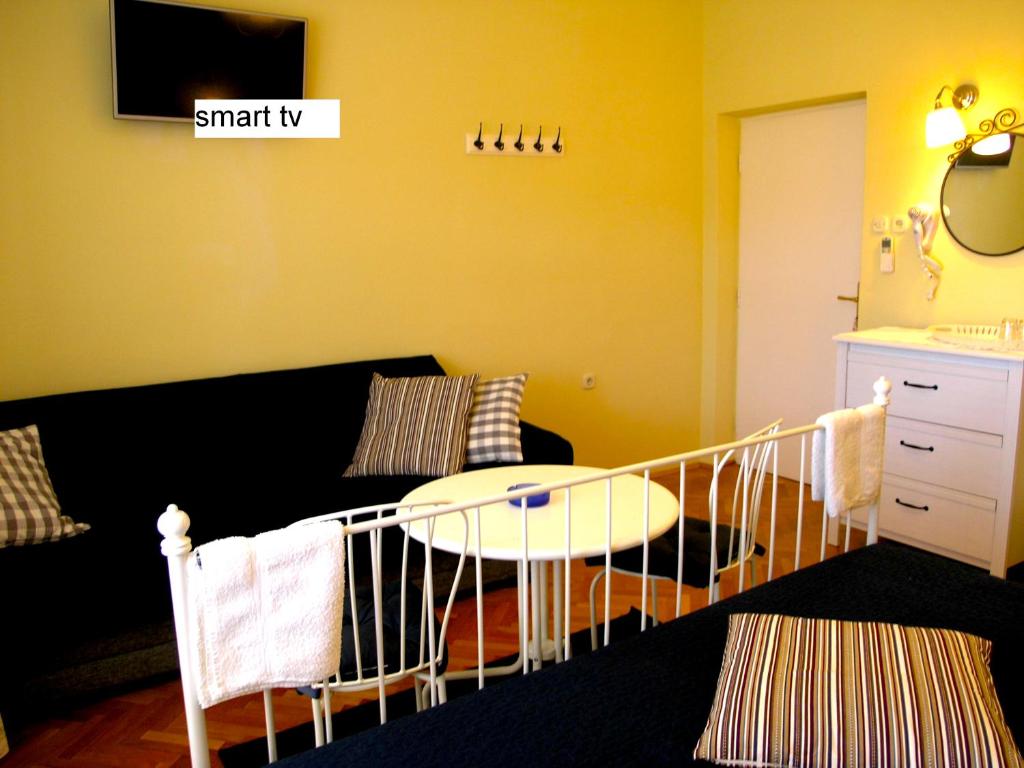 TV a/nebo společenská místnost v ubytování House Rozi