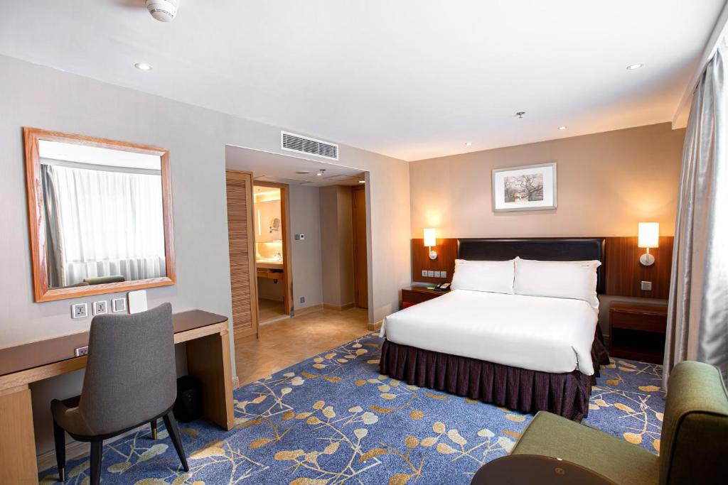 Postel nebo postele na pokoji v ubytování Holiday Inn Macau by IHG