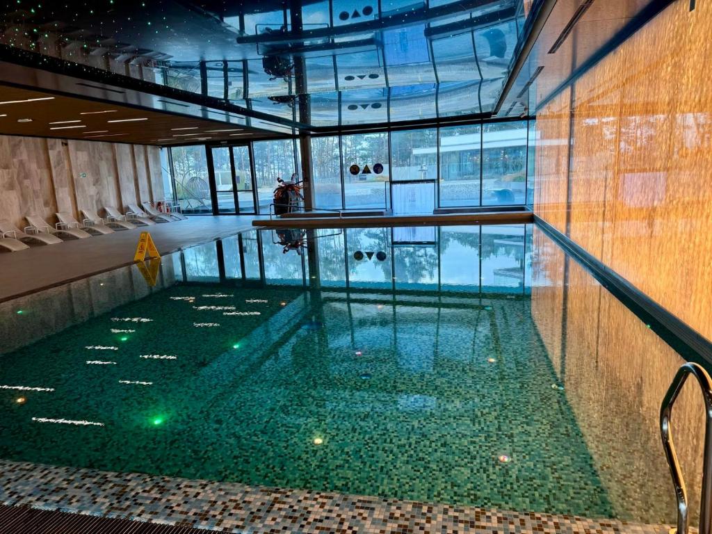 Bazén v ubytování Wave Family Apartment E997 - Resort & SPA - SEA VIEW nebo v jeho okolí