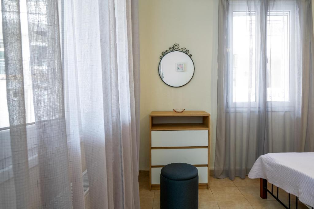 Postel nebo postele na pokoji v ubytování Adonino Apartment
