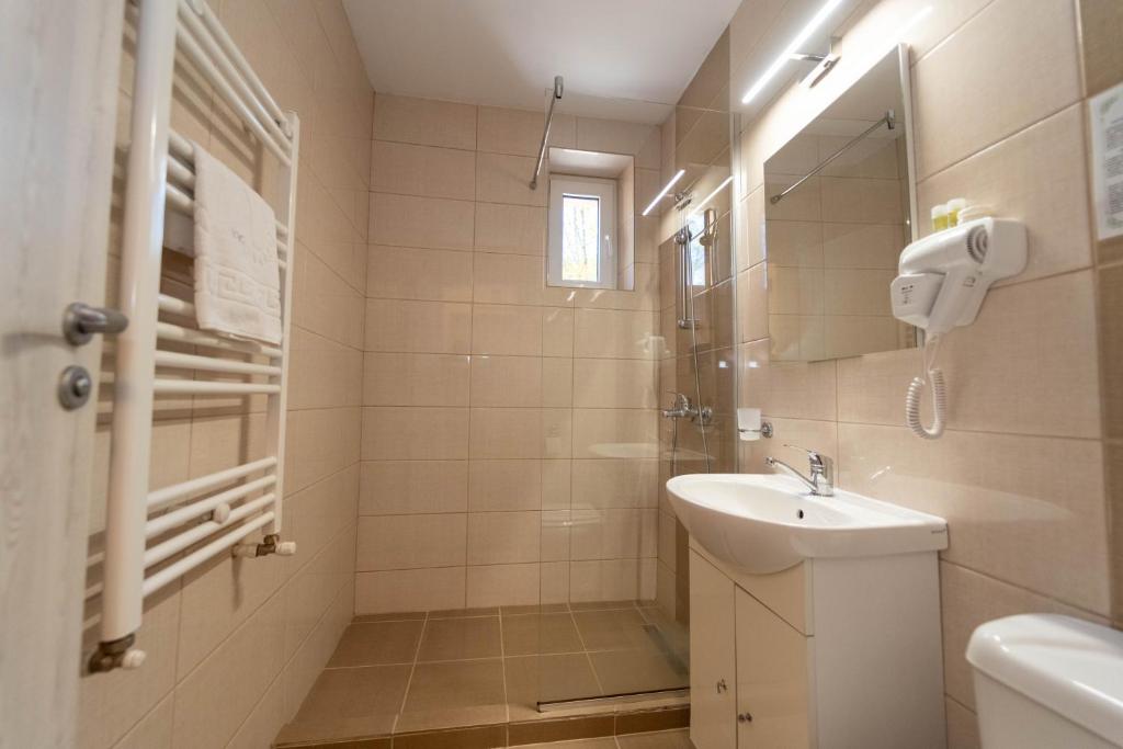 Koupelna v ubytování Hotel Cirus