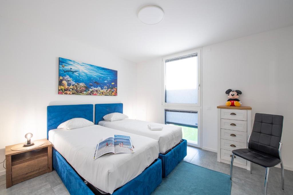 Postel nebo postele na pokoji v ubytování Melano Lab Park Apartments