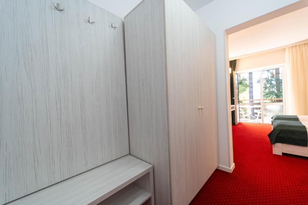 Postel nebo postele na pokoji v ubytování Hotel Cirus