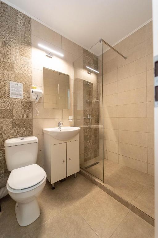 Koupelna v ubytování Hotel Cirus